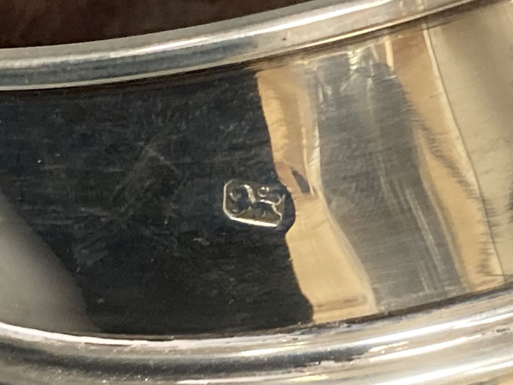 A pair of modern silver mounted wine coasters, W.E.N. London, 1985, 13.2cm.